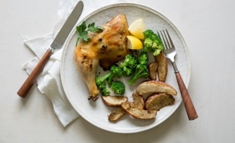Lemon-Garlic Chicken Quarters with Roasted Potatoes and Broccoli Florets